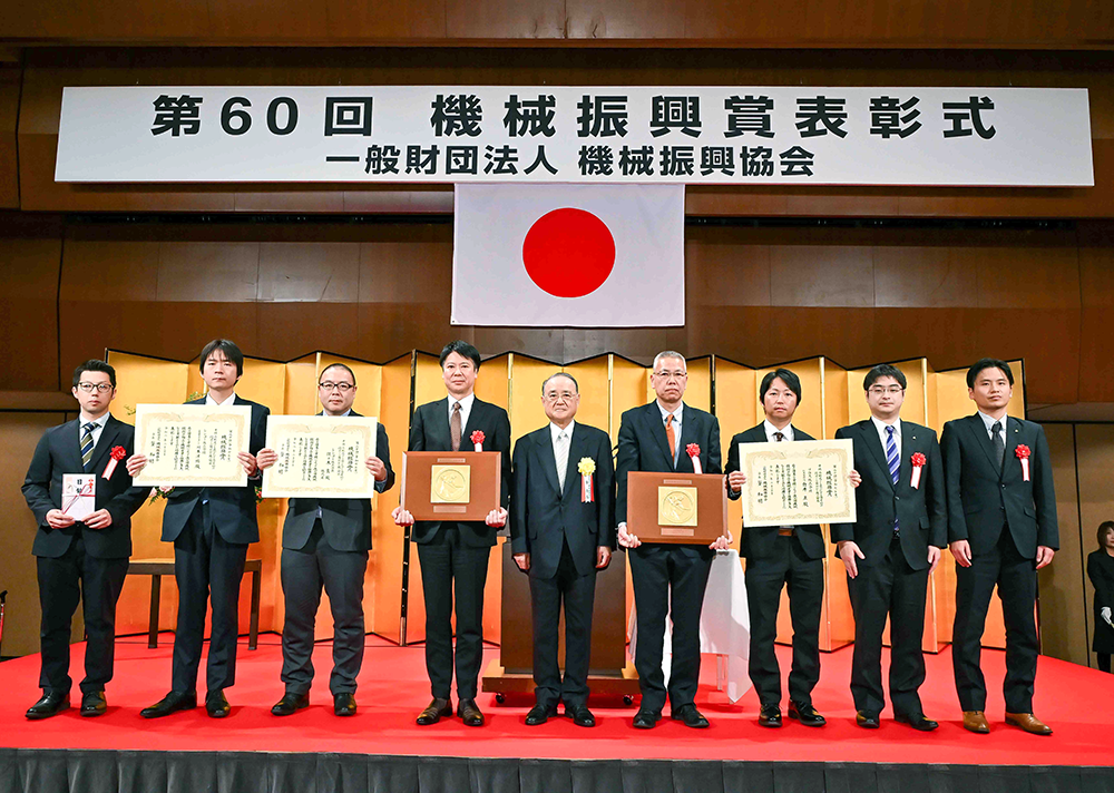 The fourth person from the left is a Rengo executive.