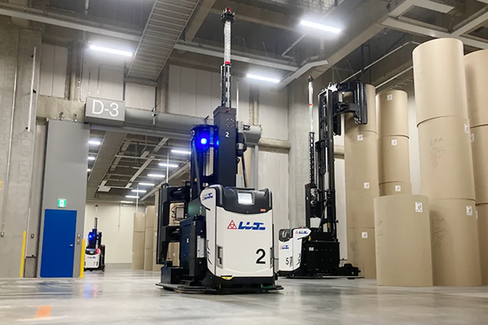 Unmanned clamp forklift operating in the warehouse